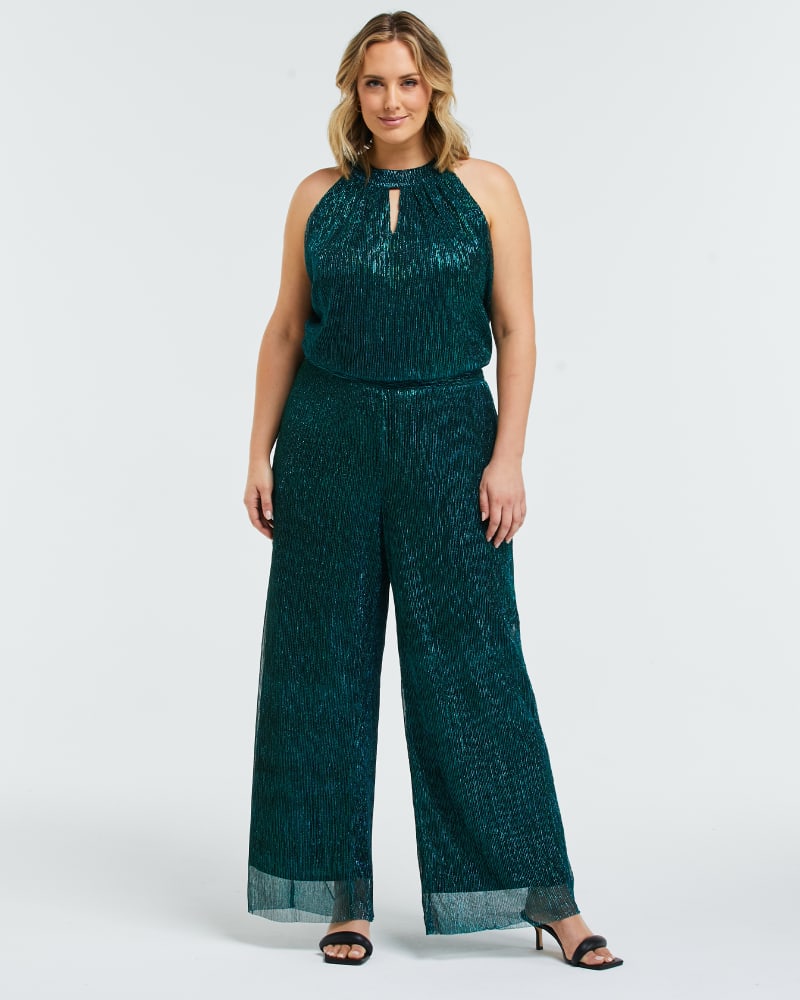 Front of a model wearing a size 1X Camille Lurex Pant in Metallic Green by Estelle. | dia_product_style_image_id:314108